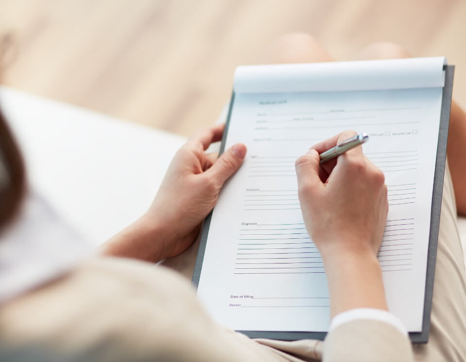 Person reviewing strata documents