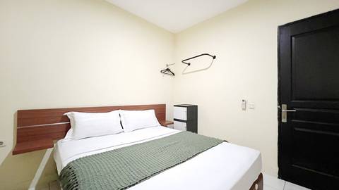 Uma Kost Azani Tawakal Tomang