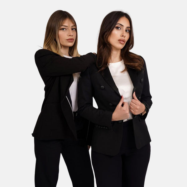 Two women in black suits