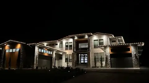 Christmas lights installation on house